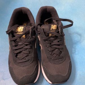 New Balance size 6 Black/Gold
